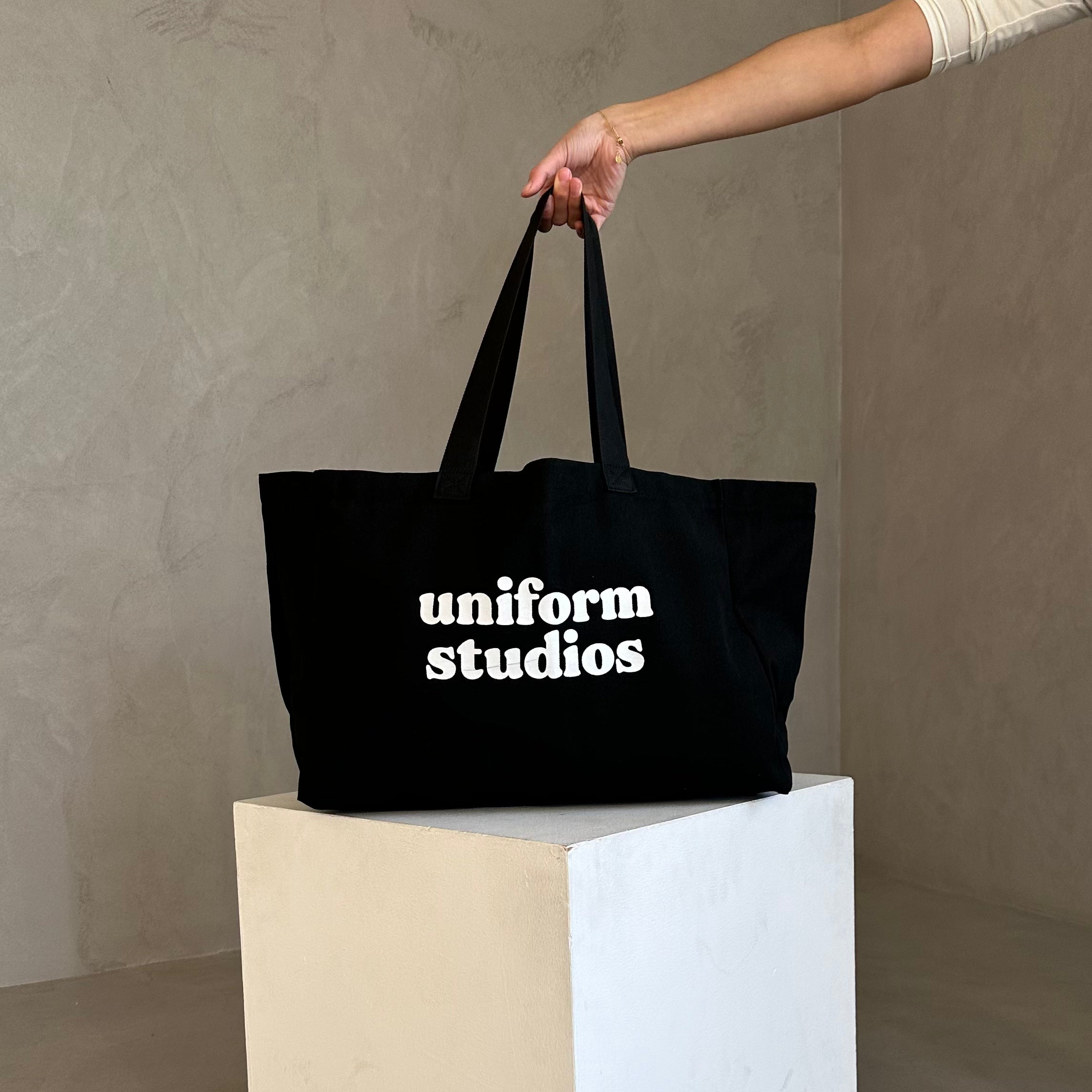 UNIFORM STUDIOS TOTE BAG